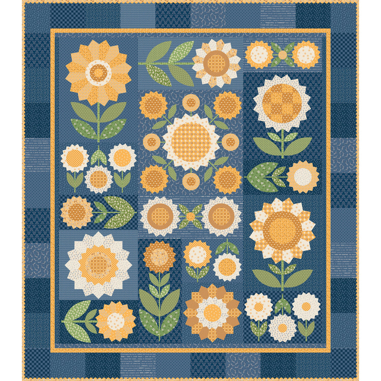 A quilt design featuring stylized sunflowers and floral motifs in yellow, orange, white, and green on a blue patchwork background with a decorative border.