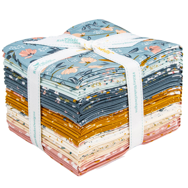 Petals & Hazel 21-piece fat quarter bundle stacked with blue, pink, cream, and butterscotch floral fabrics