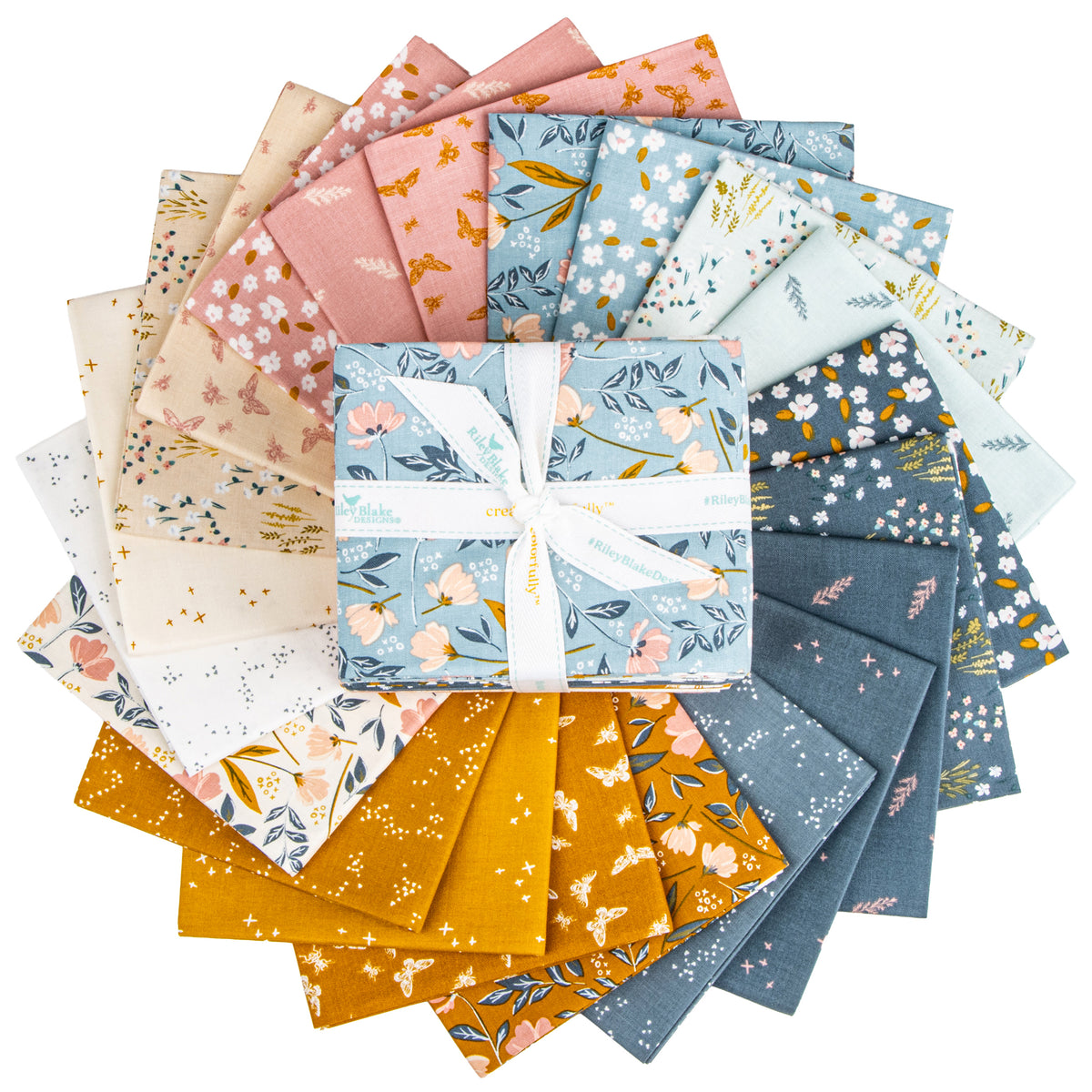 Petals & Hazel fat quarter fabrics fanned out to display 21 coordinating floral, butterfly, and nature-inspired prints