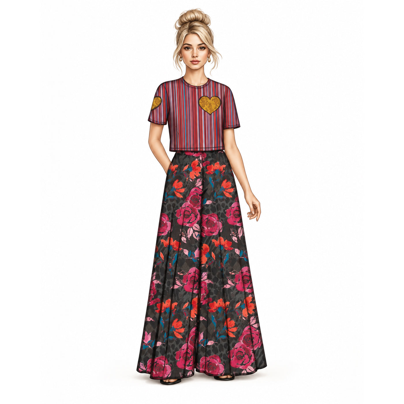 A woman modeling a two-piece outfit featuring a short-sleeve crop top with vertical red, blue, and yellow stripes and two gold heart patches, paired with a black maxi skirt with a vibrant pink, red, and orange floral print.