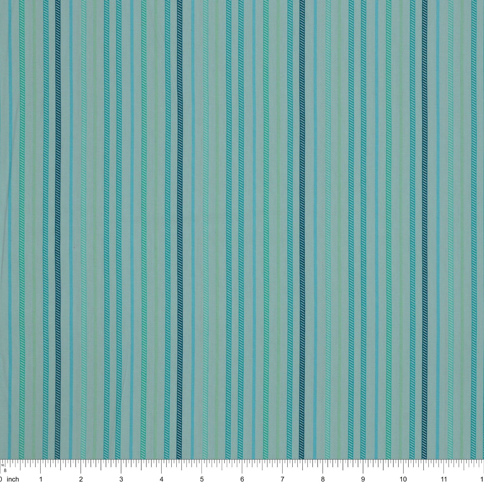Island Life Ocean Drift fabric with narrow aqua, teal, mint, and blue vertical stripes with ruler for scale
