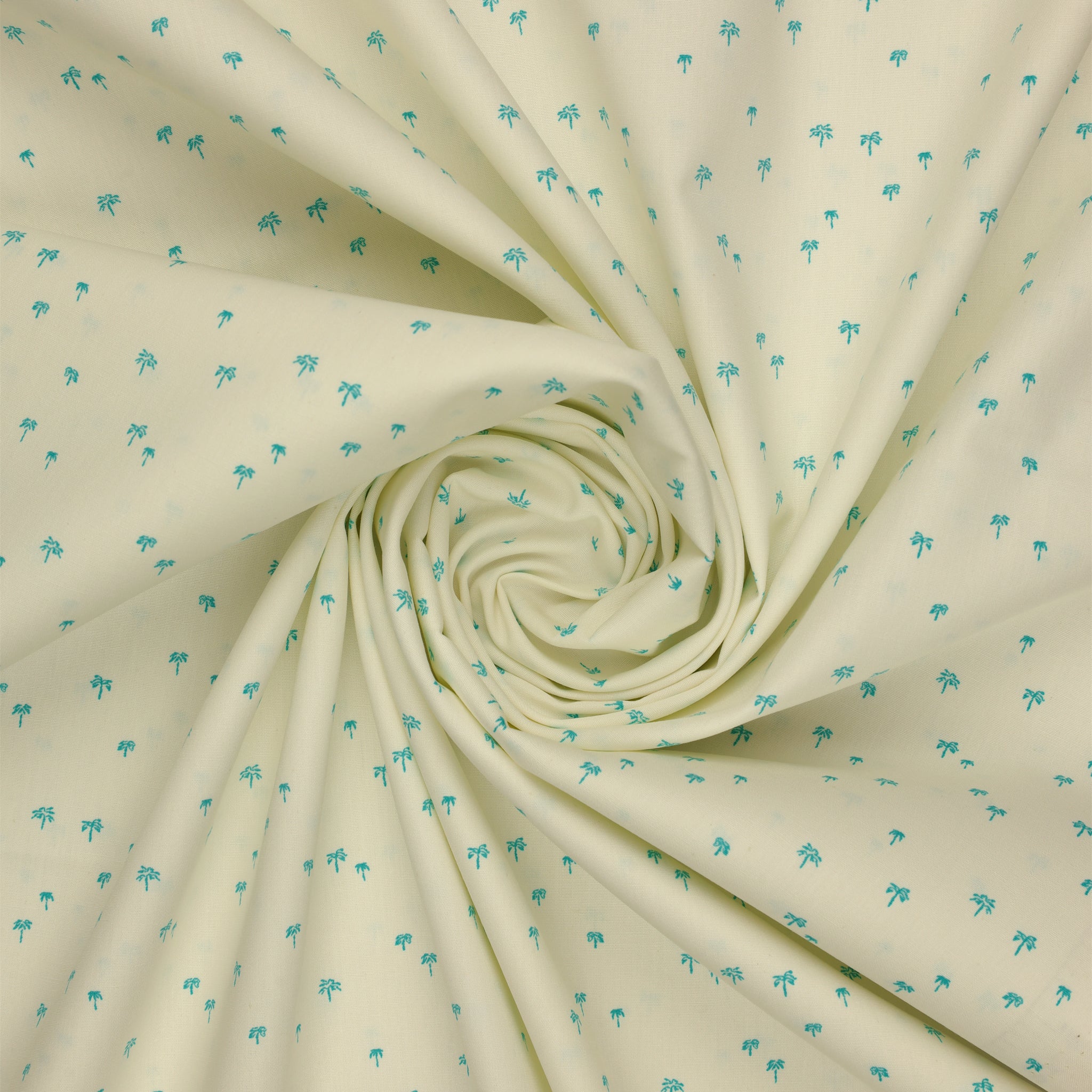 Island Life Tropic Breeze fabric with tiny turquoise palm trees scattered on a soft cream background swirled showing texture.