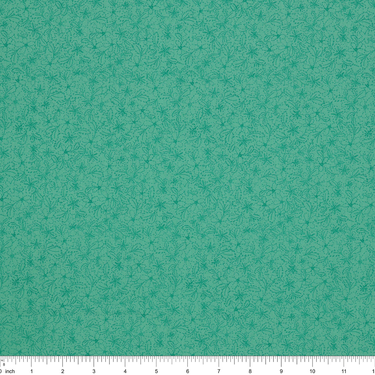 Island Life Tide Petal fabric with a subtle tonal floral pattern in layered turquoise with ruler for scale.