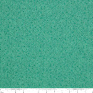 Island Life Tide Petal fabric with a subtle tonal floral pattern in layered turquoise with ruler for scale.