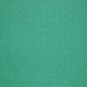Island Life Tide Petal fabric with a subtle tonal floral pattern in layered turquoise.