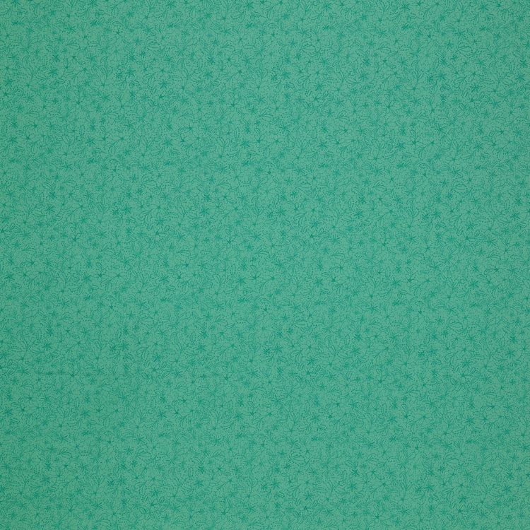 Island Life Tide Petal fabric with a subtle tonal floral pattern in layered turquoise.