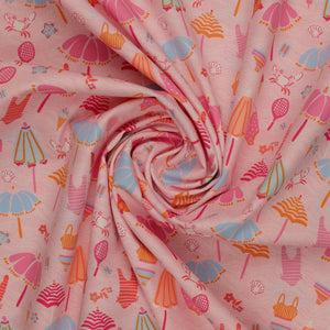 Island Life Beach Bundle fabric with umbrellas, swimsuits, tennis rackets, shells, and beach icons on pink swirled showing texture.