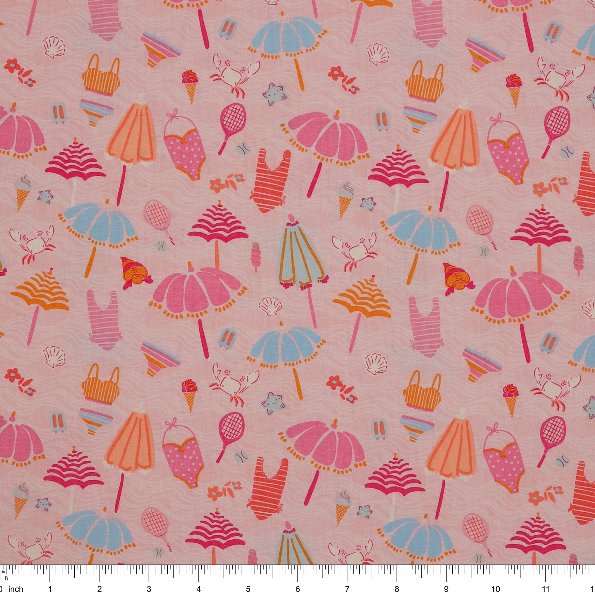 Island Life Beach Bundle fabric with umbrellas, swimsuits, tennis rackets, shells, and beach icons on pink with ruler for scale.