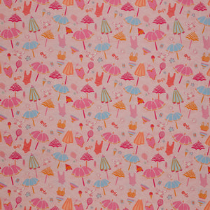 Island Life Beach Bundle fabric with umbrellas, swimsuits, tennis rackets, shells, and beach icons on pink.