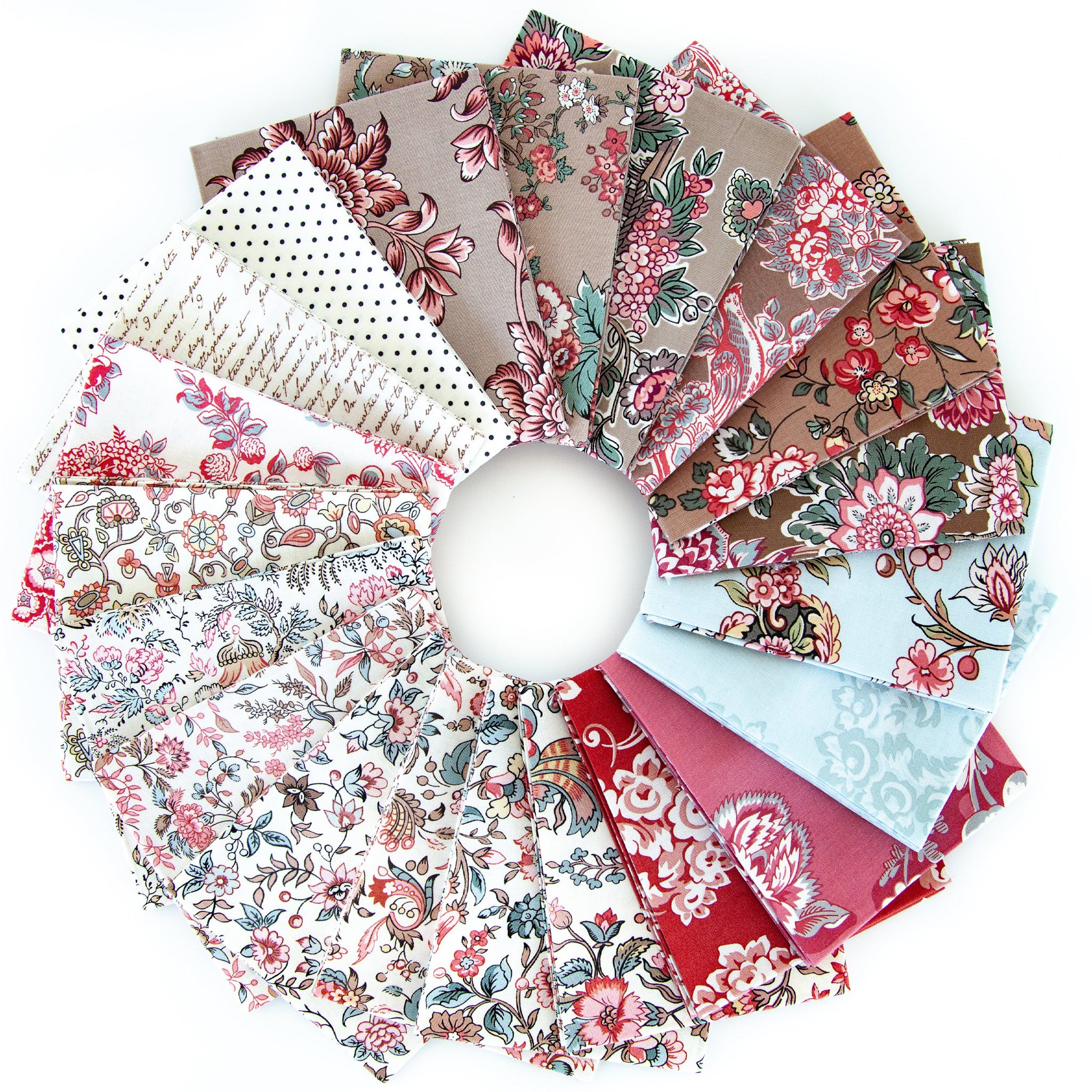 A circular arrangement of multiple fabric swatches with various patterns including florals, paisley, polka dots, and stripes in red, pink, brown, beige, light blue, and white, displayed on a clean white background.