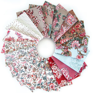 A circular arrangement of multiple fabric swatches with various patterns including florals, paisley, polka dots, and stripes in red, pink, brown, beige, light blue, and white, displayed on a clean white background.