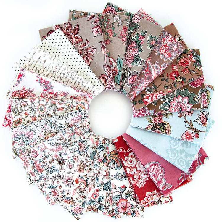 A circular arrangement of multiple fabric swatches with various patterns including florals, paisley, polka dots, and stripes in red, pink, brown, beige, light blue, and white, displayed on a clean white background.