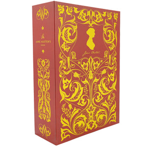 A Jane Austen's Books hardcover book box set featuring a red dust jacket with ornate gold Art Nouveau illustrations and a gold silhouette of Jane Austen on the front, with the spine visible showing the title and author.
