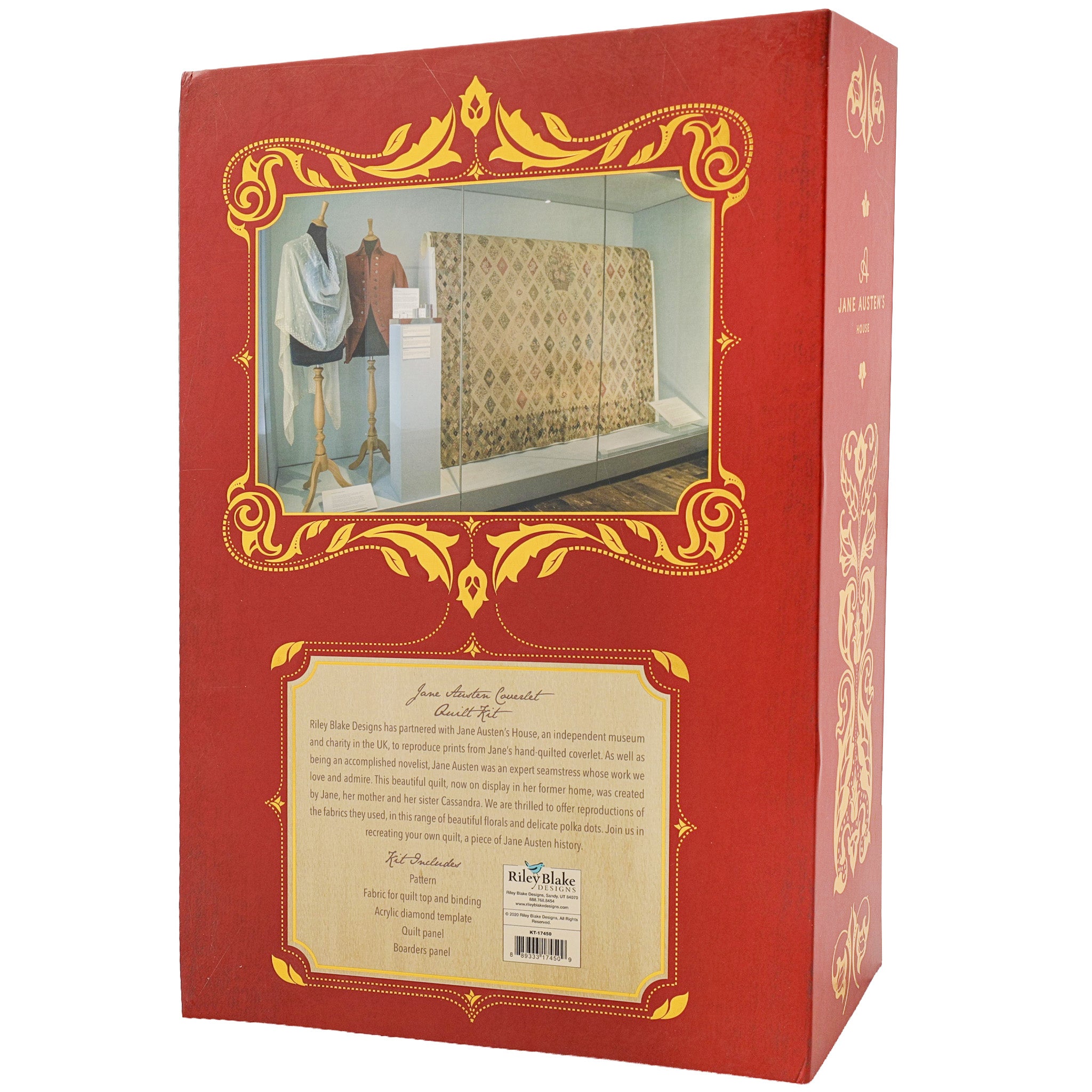 Red and gold presentation box for the Jane Austen Quilt Kit, featuring an ornate gold frame illustration of a quilt display and a beige product information label near the bottom.