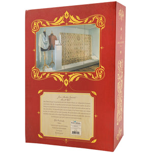 Red and gold presentation box for the Jane Austen Quilt Kit, featuring an ornate gold frame illustration of a quilt display and a beige product information label near the bottom.