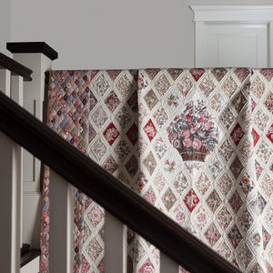 Stair runner with floral diamond pattern on a staircase