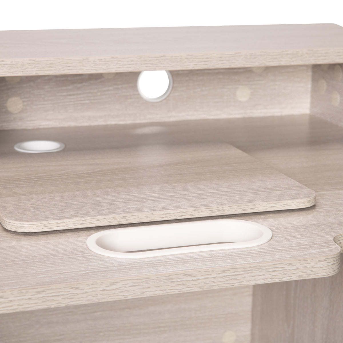 Close-up of Koala Serger Studio in light wood grain showing platform insert, grommeted holes and oval cutout