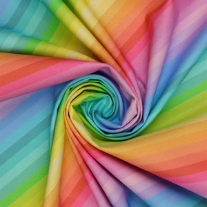 Pastel Rainbow Diagonal Stripe fabric arranged in a spiral, showcasing delicate rainbow stripes in pastel pink, yellow, mint, aqua, and lavender.