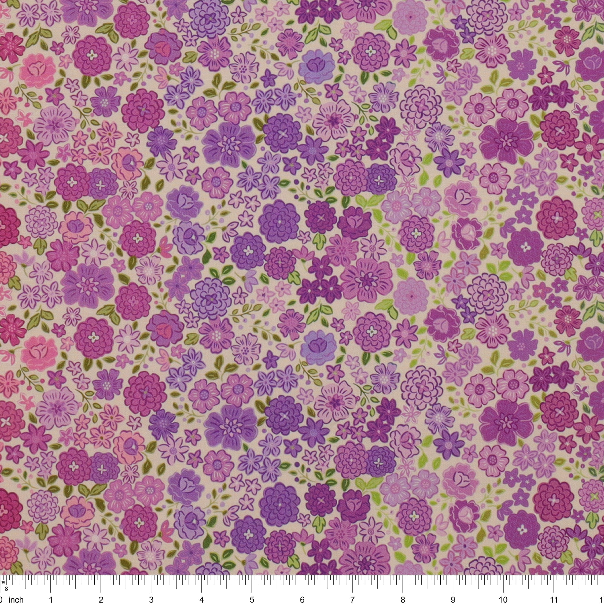 Berry Boho Blooms Ombre fabric with purple and pink flowers and green leaves on a cream background.