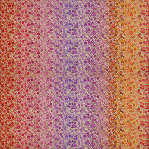Berry Boho Blooms Ombre fabric with floral colors transitioning from pink and purple to orange and red.