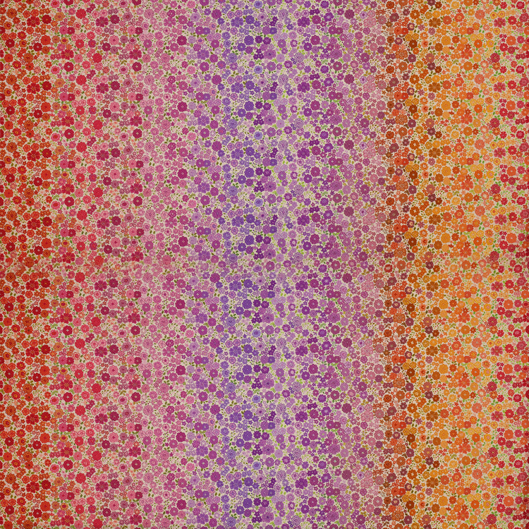 Berry Boho Blooms Ombre fabric with floral colors transitioning from pink and purple to orange and red.