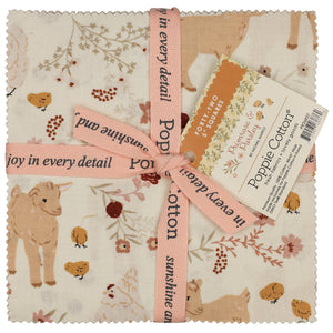 Fabric square with scalloped edges, featuring a whimsical woodland print of a goats, chicks, flowers, and leaves in soft earthy tones. The fabric is wrapped with a pink ribbon.