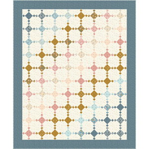 A quilt design featuring a cream background with a repeating geometric diamond lattice pattern in muted blue, dusty pink, mustard gold, and beige, framed by a wide dusty blue border.