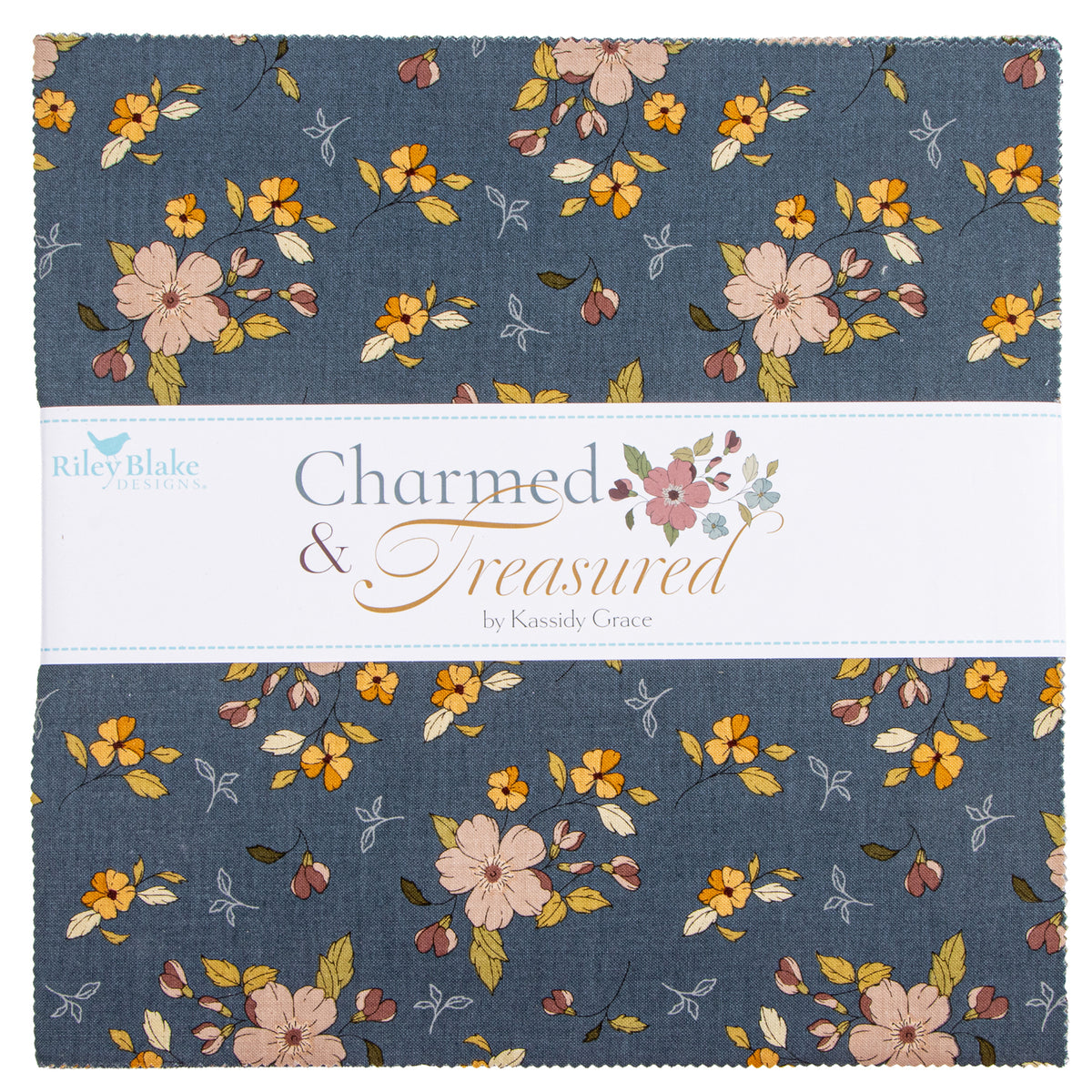 Charmed & Treasured fabrics featuring a dusty slate blue floral pattern with pink, yellow, and orange blossoms, separated by a white paper band.
