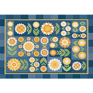 A puzzle design featuring a patchwork of yellow, white, and green floral motifs on a blue background, bordered by a blue-and-white check pattern.