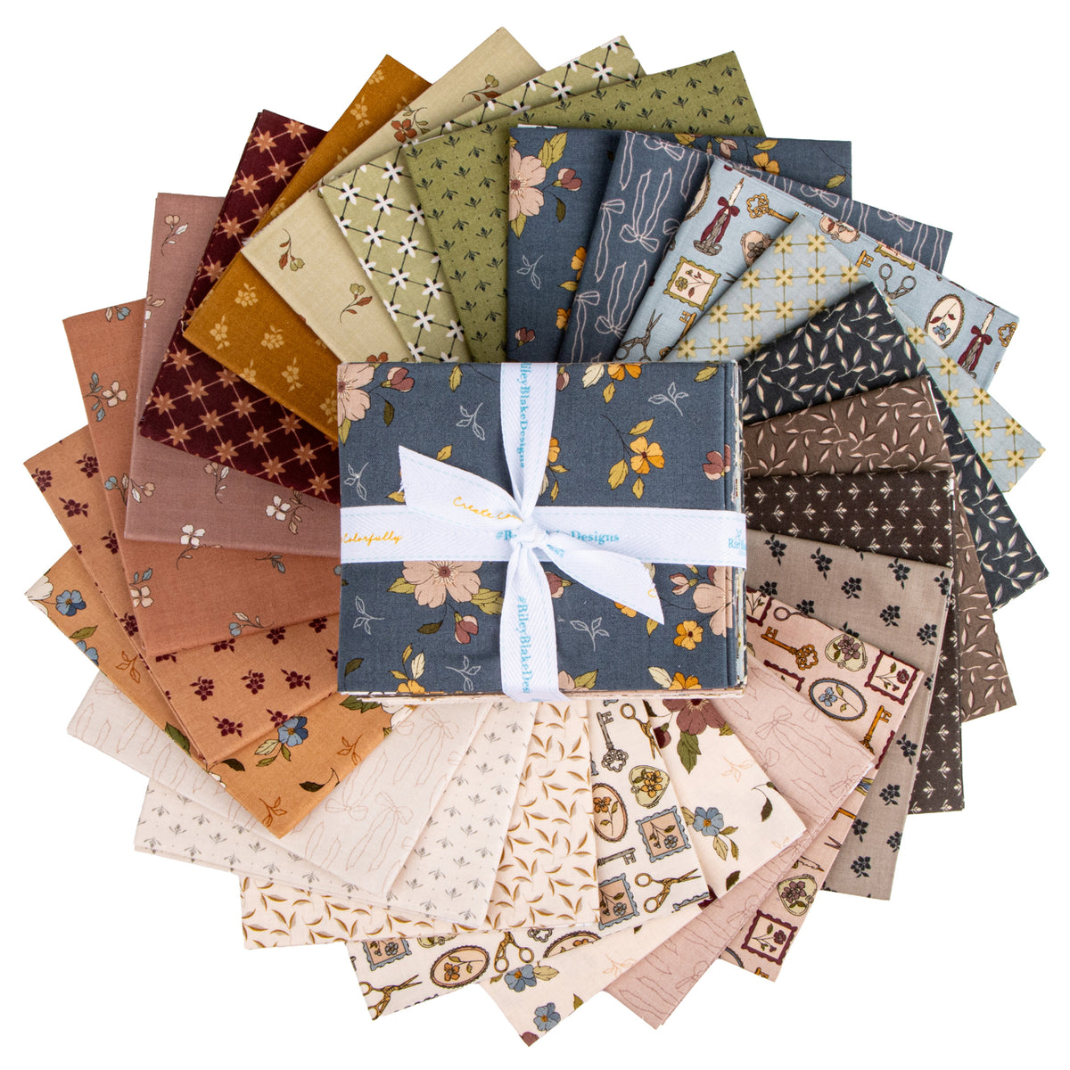 A bundle of fabric squares arranged in a circular fan, with a central folded square tied in a white ribbon.