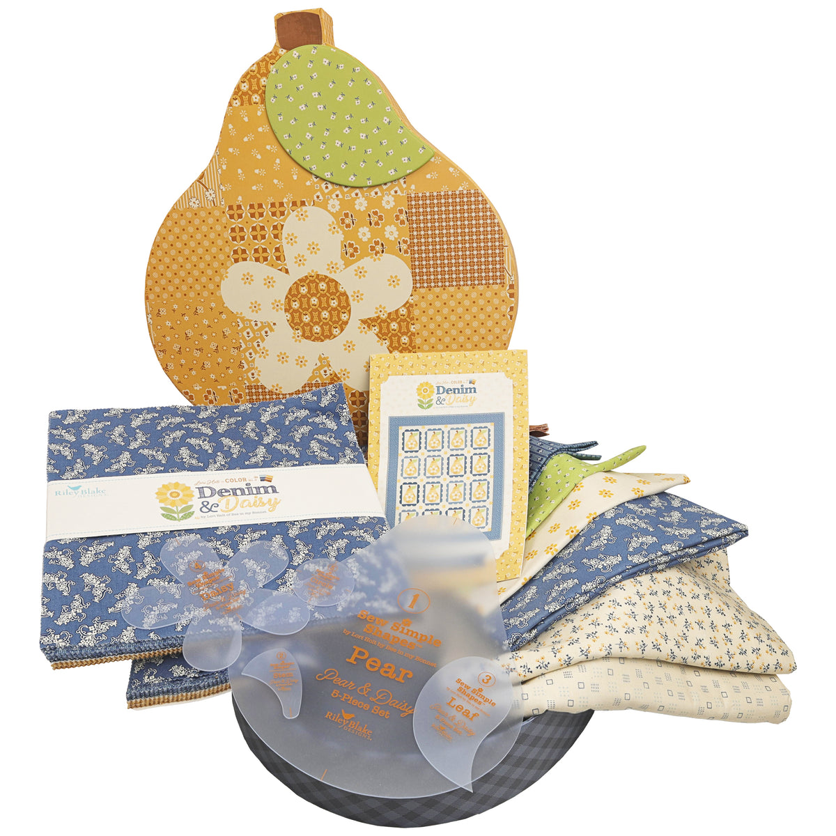 A quilt kit featuring a pear keepsake box, fabrics, a pattern and template set.