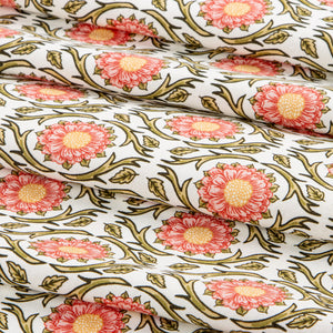 Cream fabric with coral flowers, curling green vines, and scattered leaves.