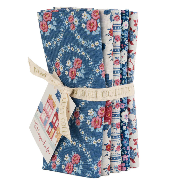 Tilda Village Life Blue Fat Quarter Bundle with 5 blue, pink and cream floral fabrics.