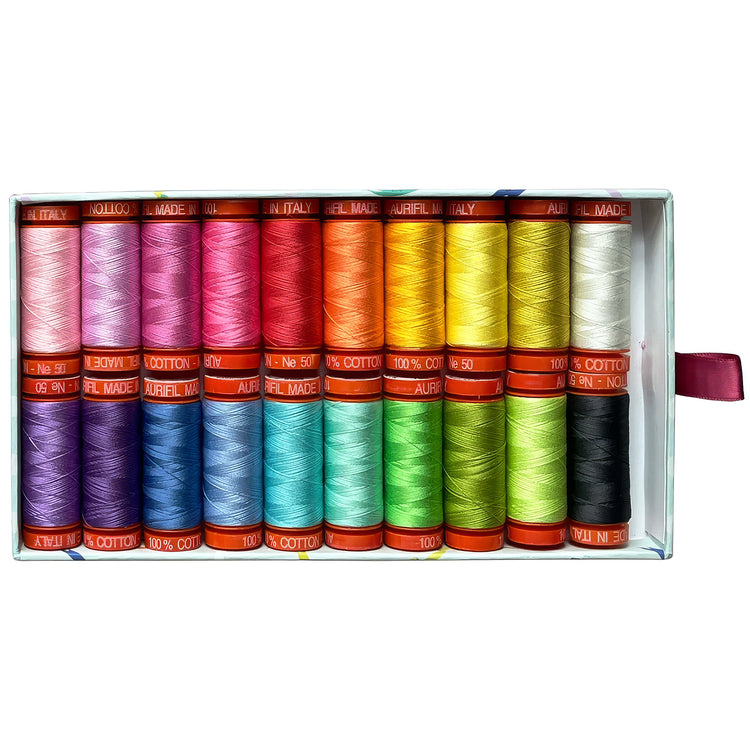 A boxed set of 20 spools of sewing thread in a rainbow color assortment, arranged in two rows inside a white cardboard box with a purple pull tab on the right side.