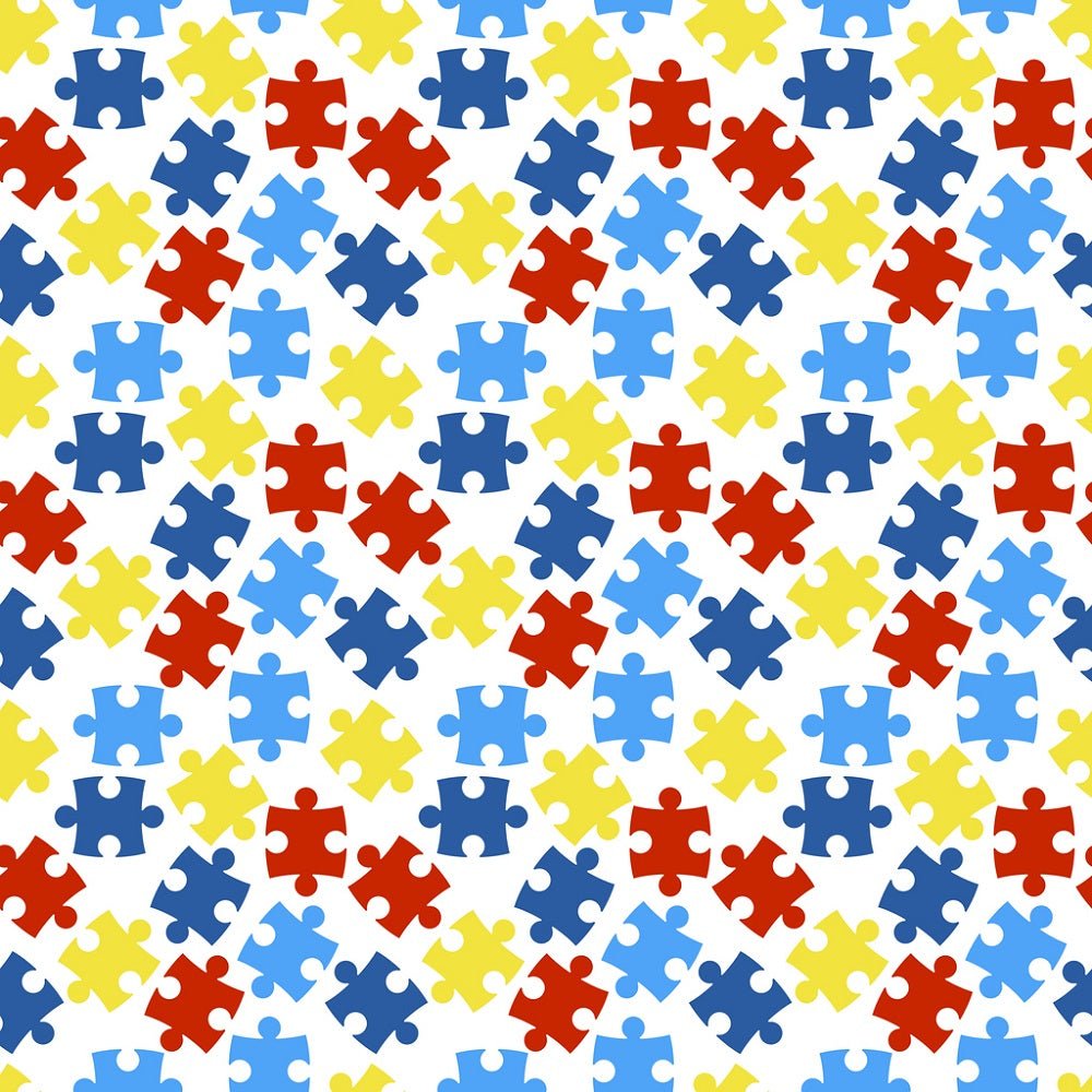 Autism Awareness Scattered Puzzle Pieces Fabric