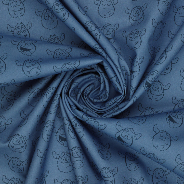 Yeti-tude Blue fabric with rows of expressive yeti faces outlined in navy on a muted blue background arranged in a swirl.